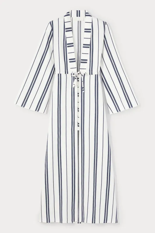 White and blue belted long dress with bell sleeves sold by DESTREE