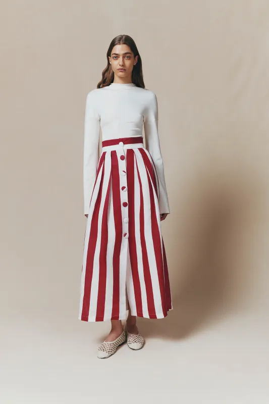 White and fuchsia linen button-front pleated maxi skirt sold by DESTREE