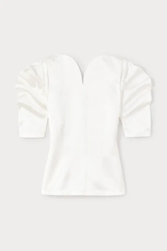 Ecru top with puff sleeves sold by DESTREE