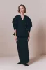 Black textured top with structured sleeves sold by DESTREE