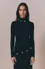Black long-sleeve dress with button details sold by DESTREE