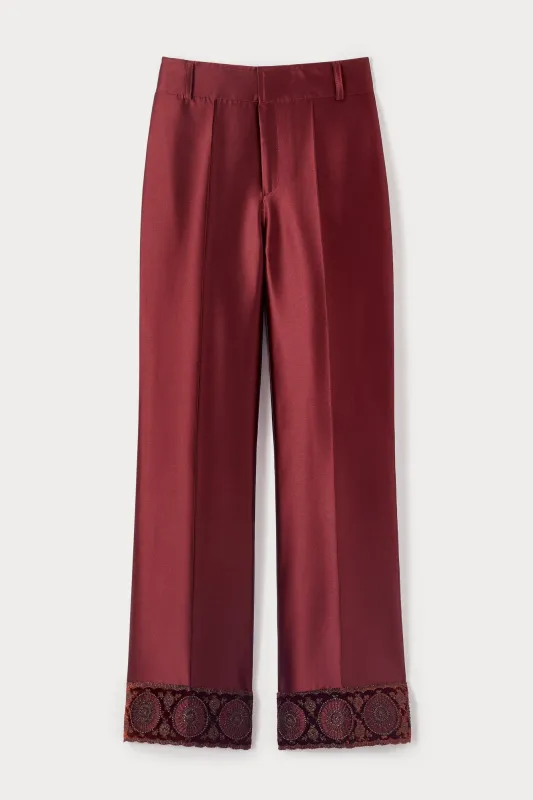 Burgundy satin straight pants with embroidered details sold by DESTREE