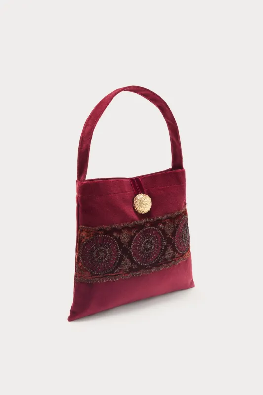 Burgundy velvet bag with embroidered detailing sold by DESTREE