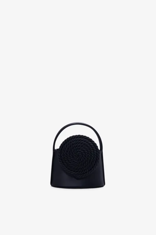 Black mini satin bag with passementerie details sold by DESTREE