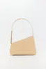 BEIGE Asymmetric Leather Quilted Bag sold by DESTREE