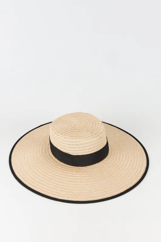 Natural straw hat with black band made by Annie