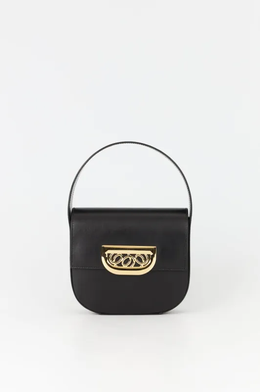 Black leather bag with golden latch made by DESTREE