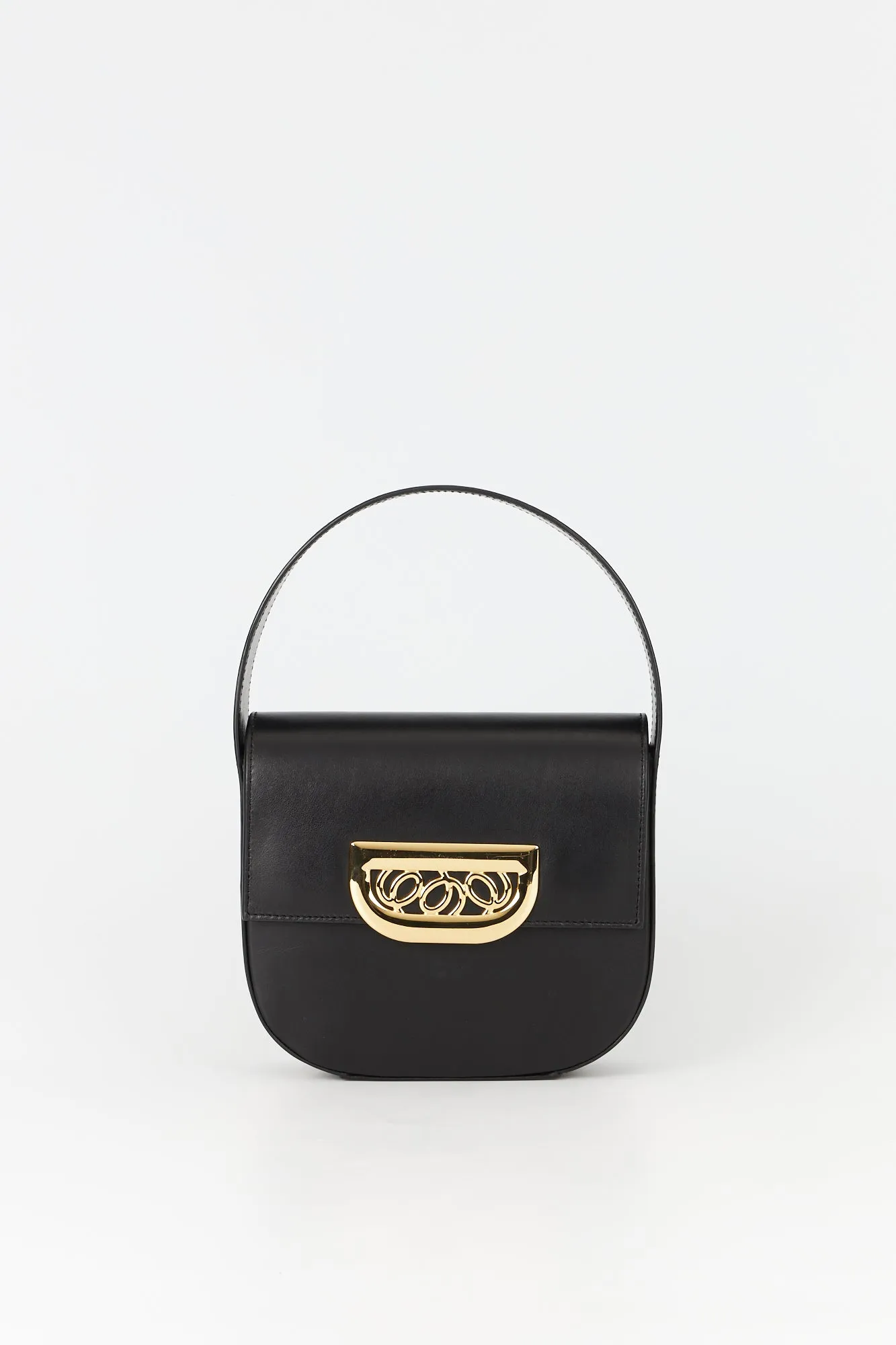 Black leather bag with golden latch sold by DESTREE