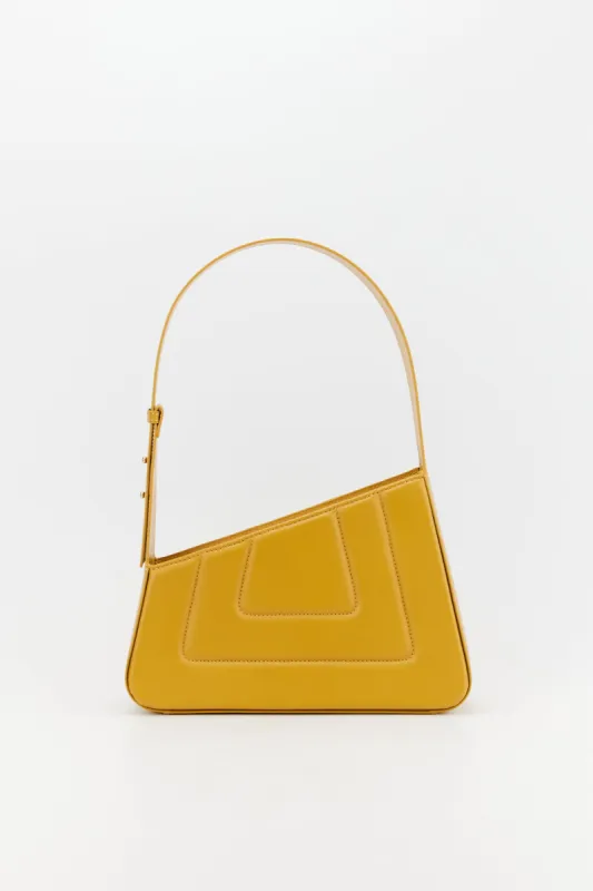 Mustard asymmetric leather quilted bag made by DESTREE