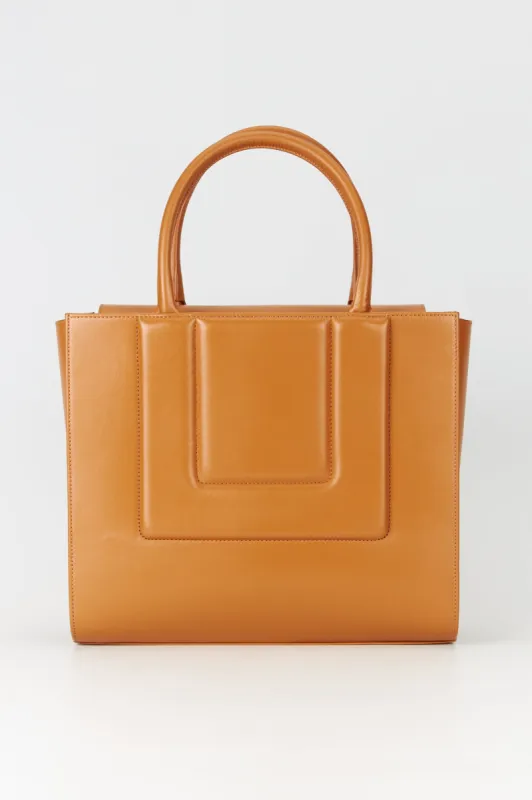 Tobacco leather structured tote sold by DESTREE