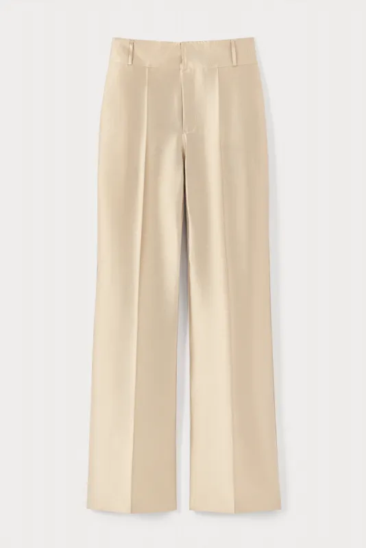 Beige satin flared pants sold by DESTREE