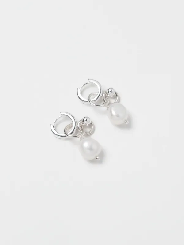 Huggie Hoop Pearl Earrings made by Wolf Circus