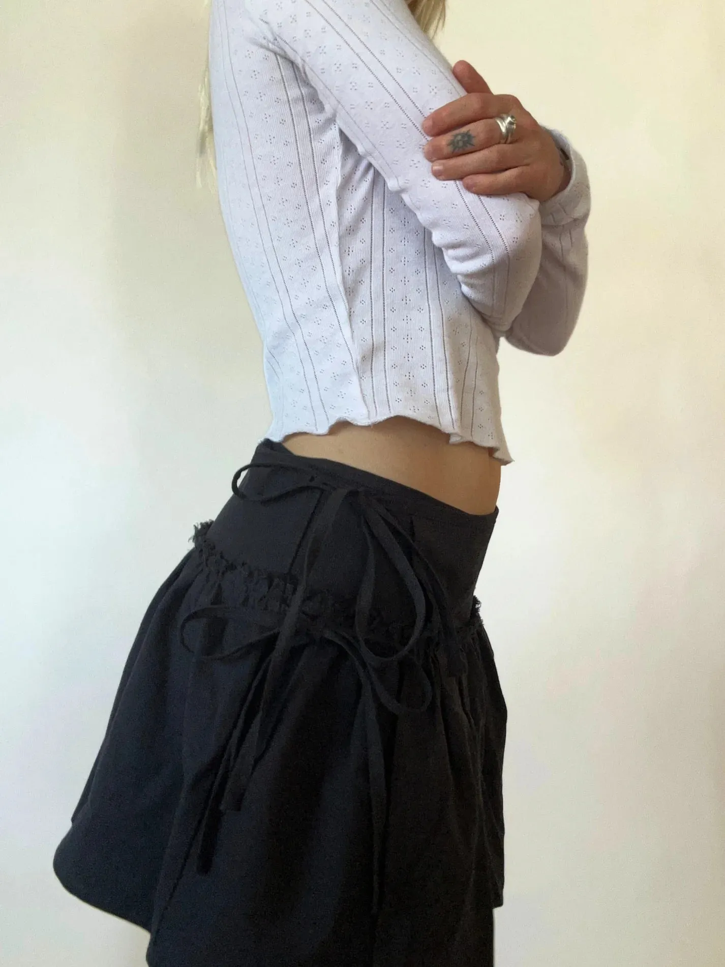 Wells Wrap Mini Skirt Black sold by Merge Curated goods