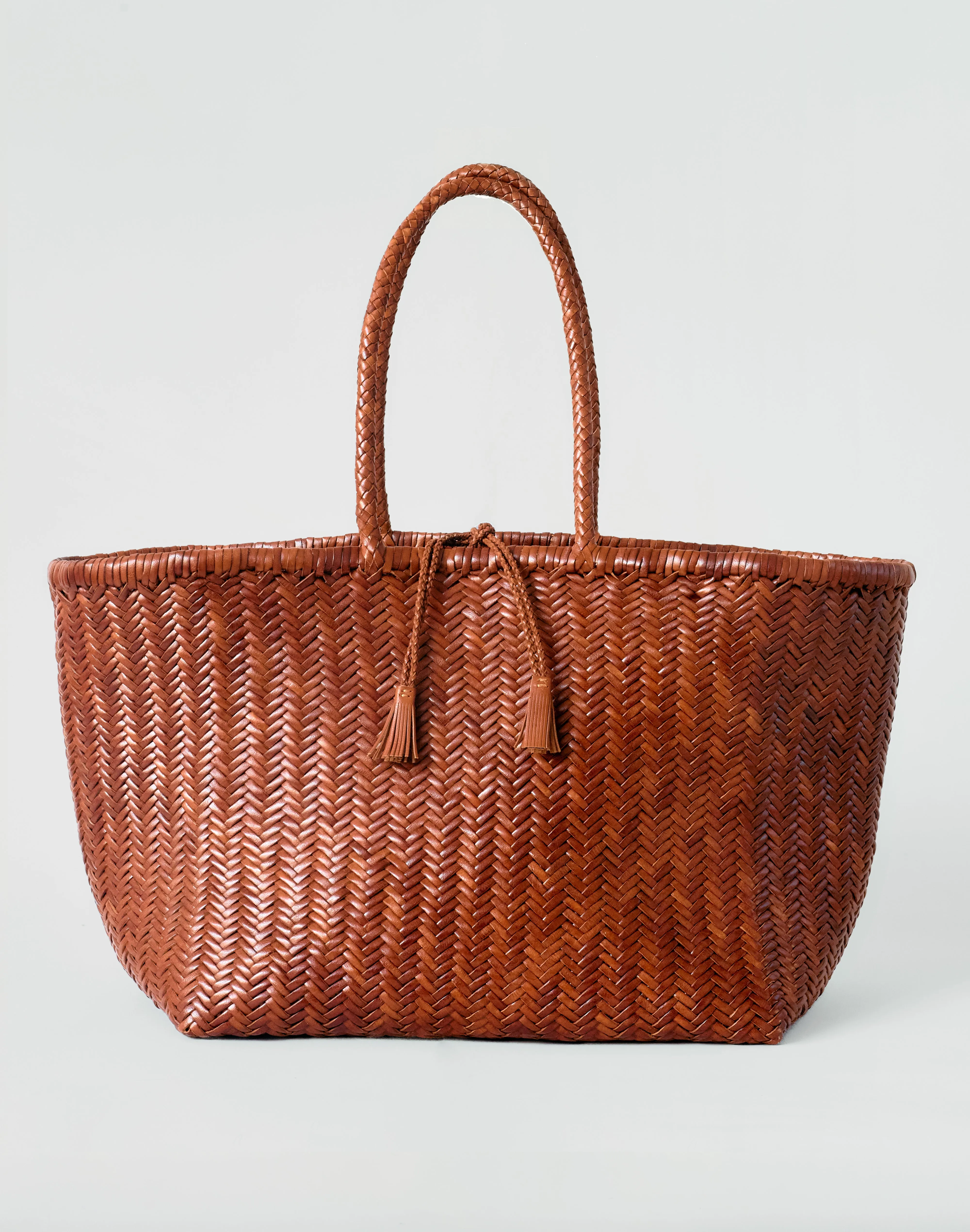 The Mercato Woven Leather Tote Bag sold by HYER GOODS