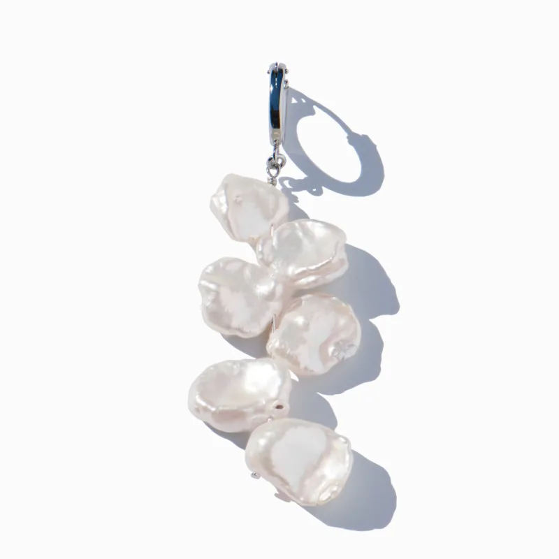 Orchid Earring sold by MING YU WANG