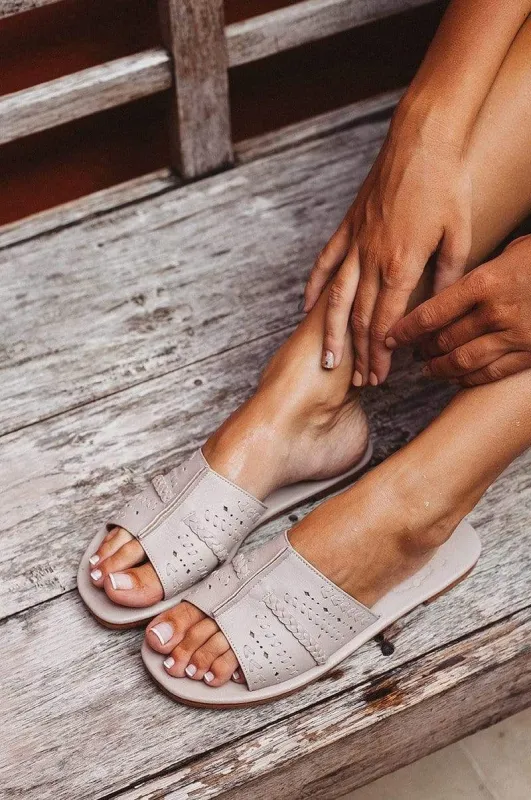 Dolce Vita Slide Shoes in Ivory sold by Ocelot Market