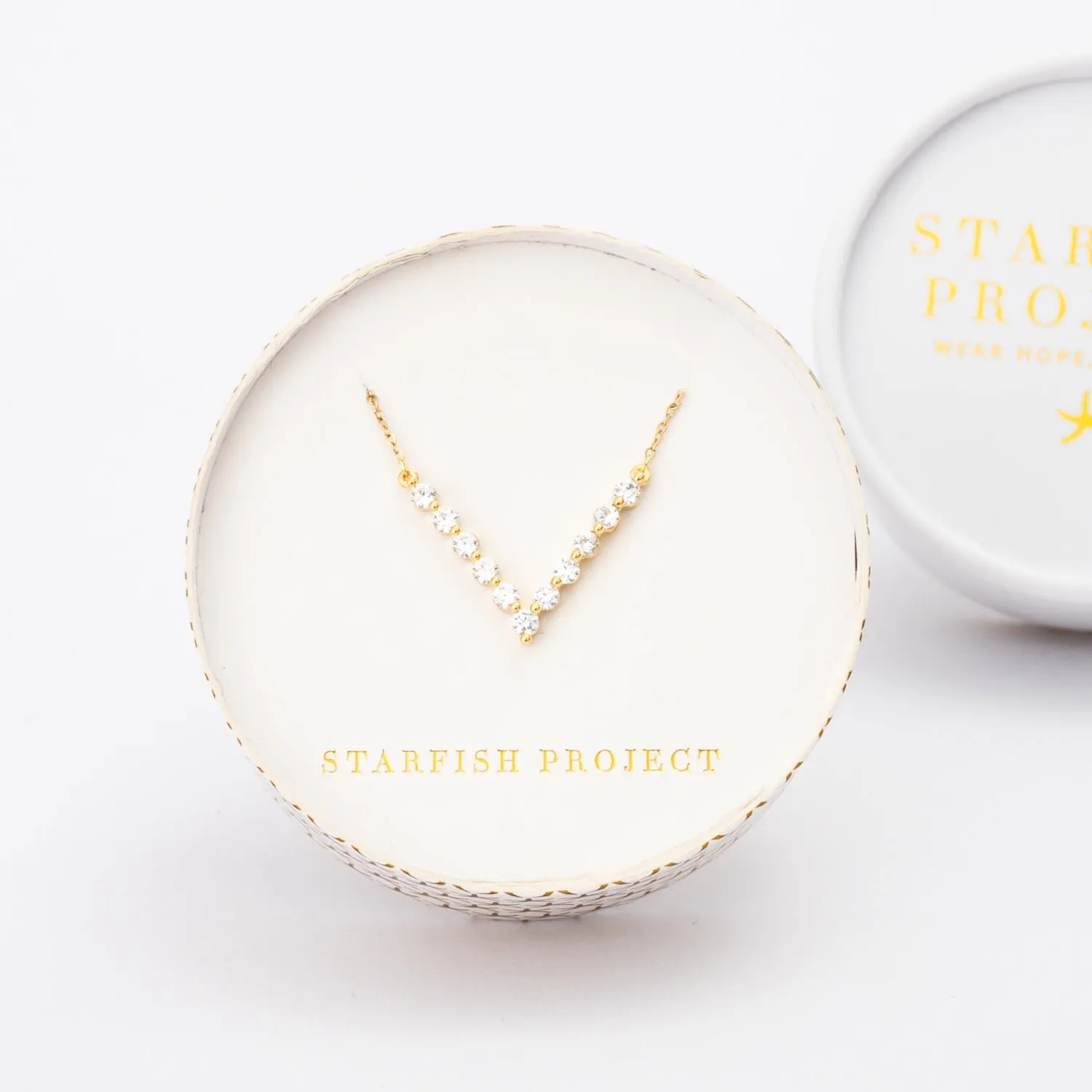 Brilliance V-Bar Chevron Zircon & Gold Necklace sold by Ocelot Market product image thumbnail 4