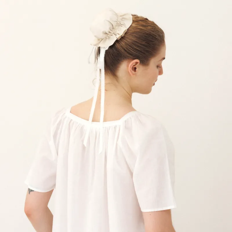 Ivory Silk Bun Cover made by Salter House