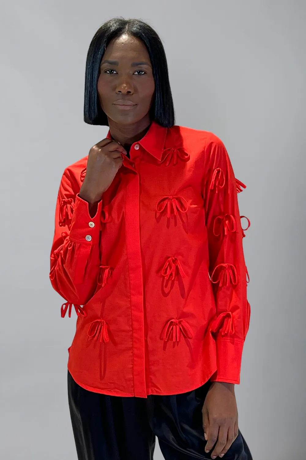 Bow Button Down sold by Hope for Flowers