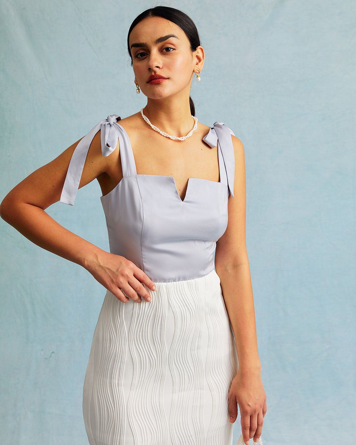 The Light Blue Tie Shoulder Cami Top sold by rihoas