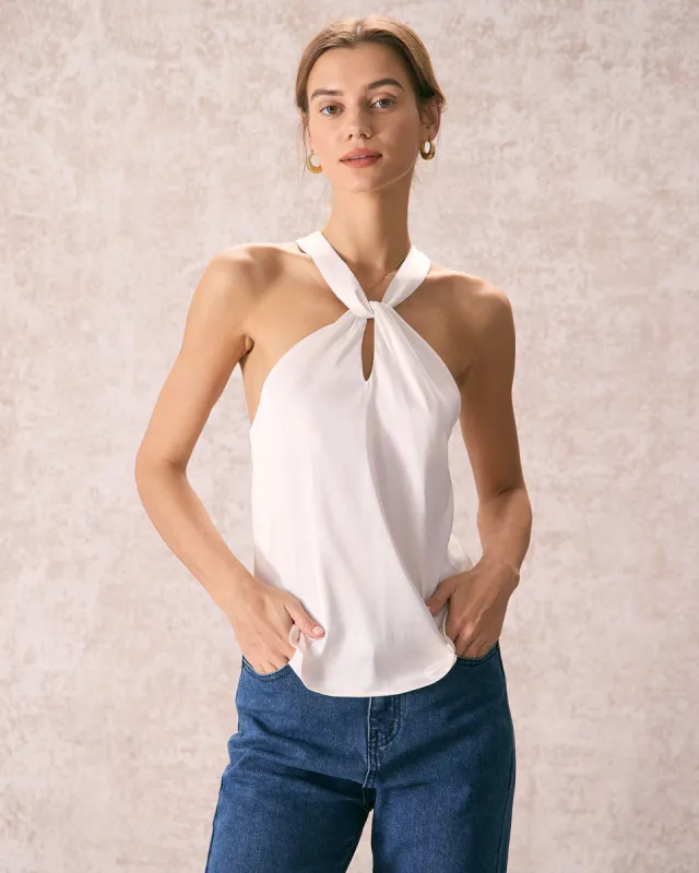 The Beige Halter Cut Out Satin Cami Top sold by rihoas