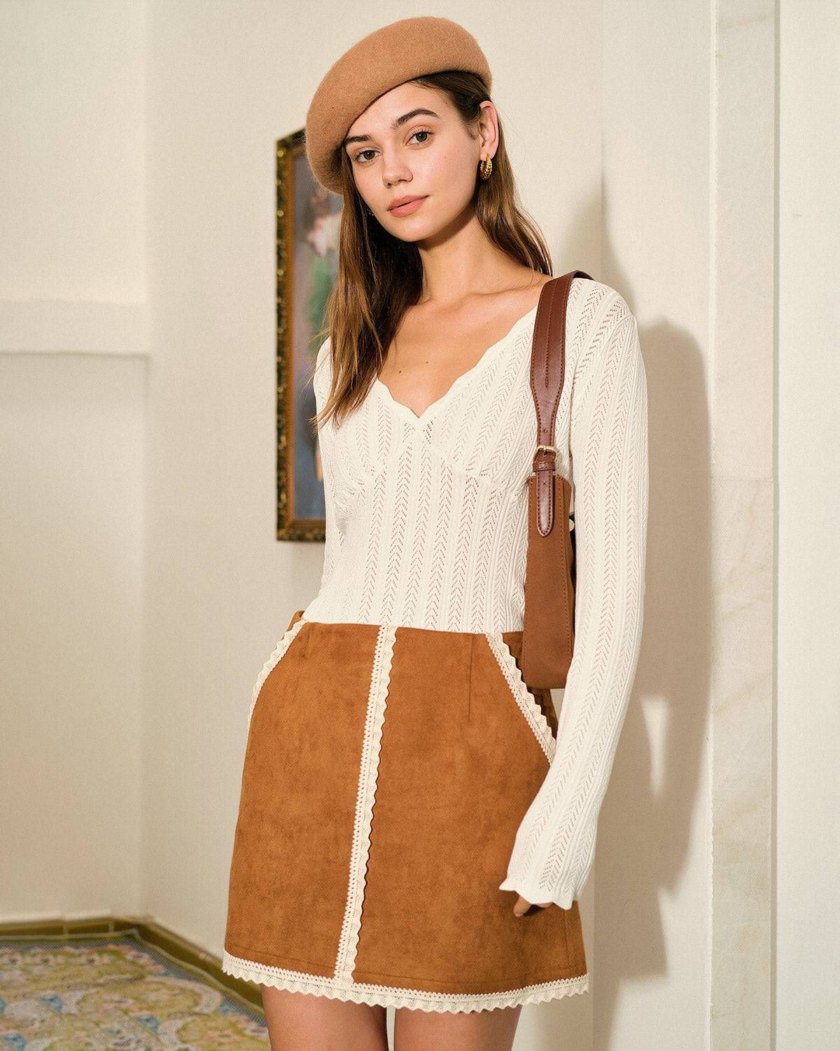 The Scallop-edge Solid Knit Top sold by rihoas