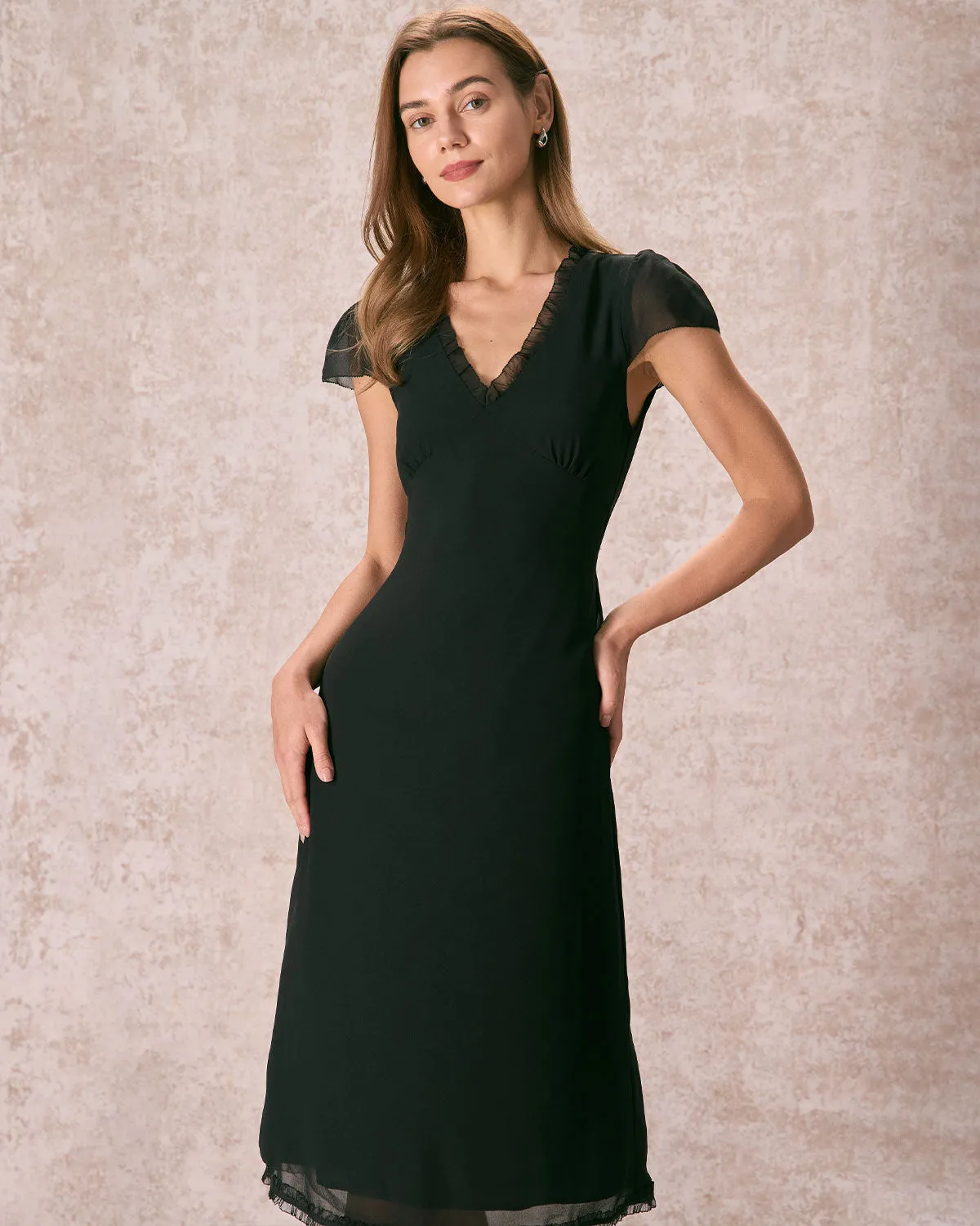 The Black V Neck Ruffle Sheer Midi Dress sold by rihoas