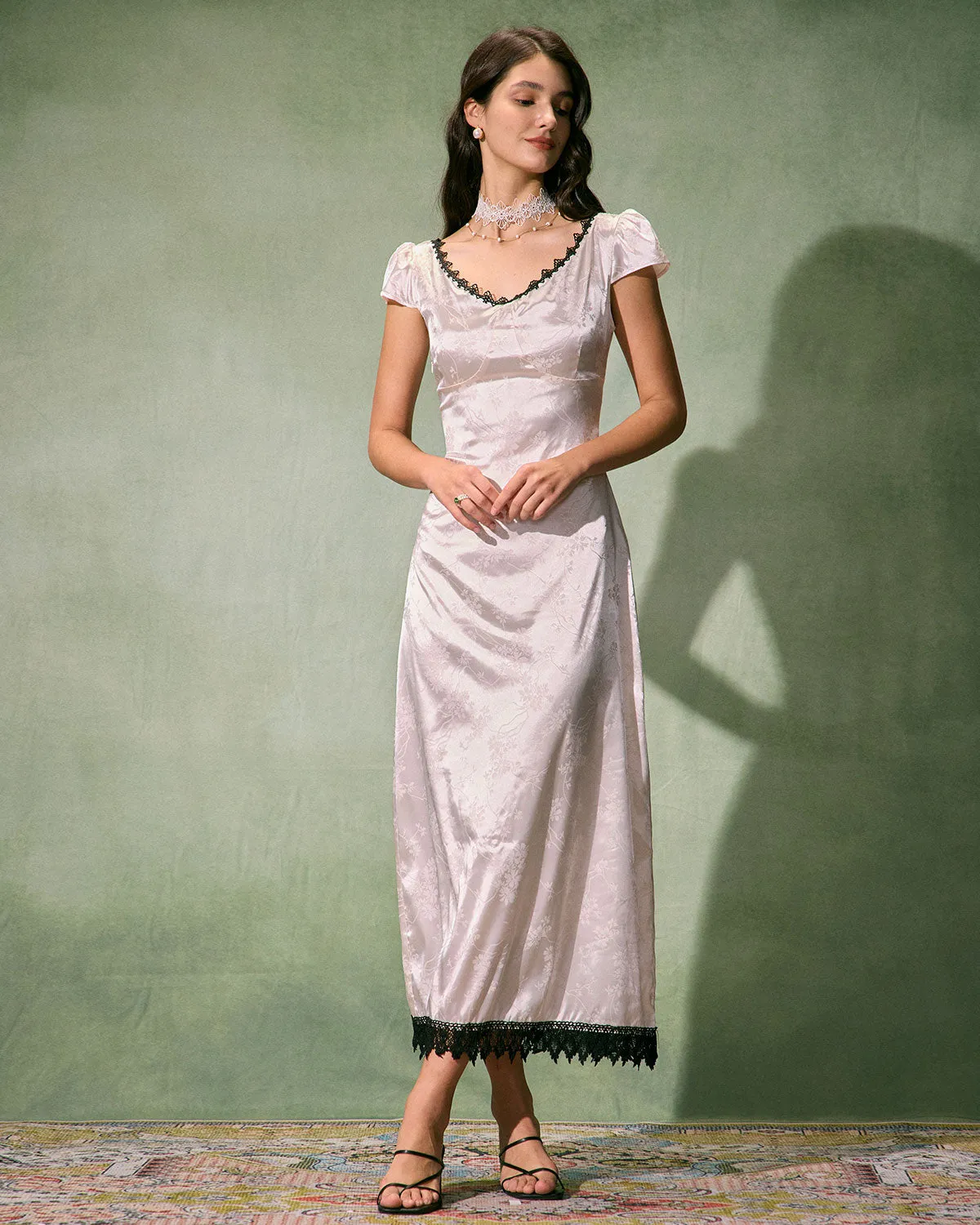 The White Jacquard Lace Satin Maxi Dress sold by rihoas