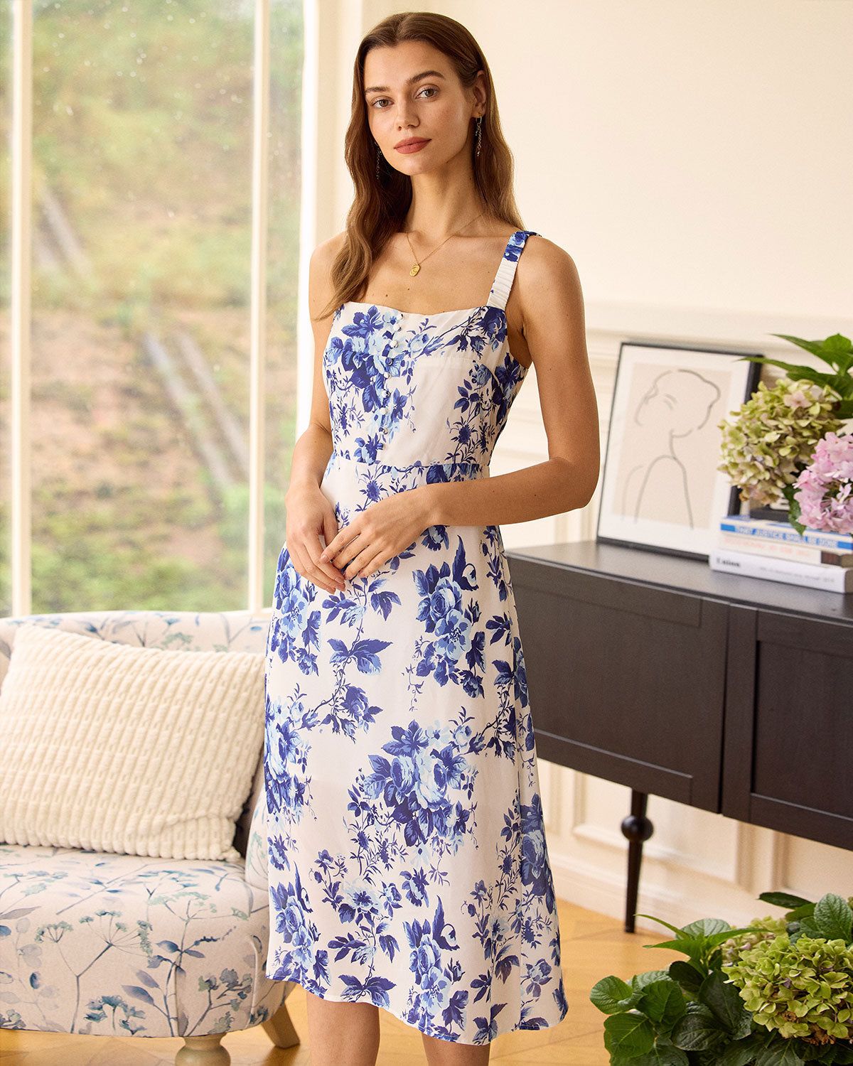 The Blue Elasticized Shoulder Straps Floral Dress sold by rihoas