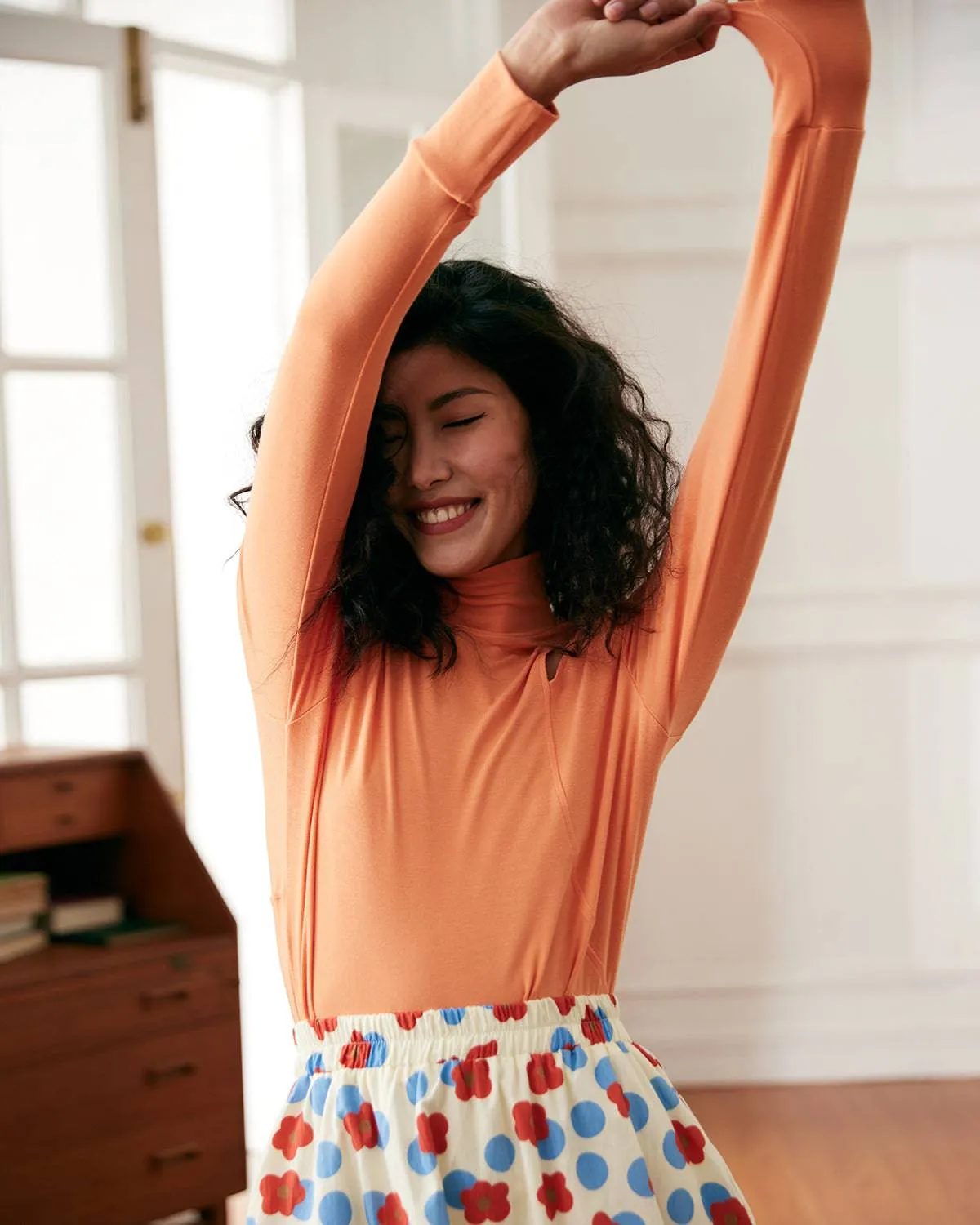 The Mock Neck Cutout Tee sold by rihoas