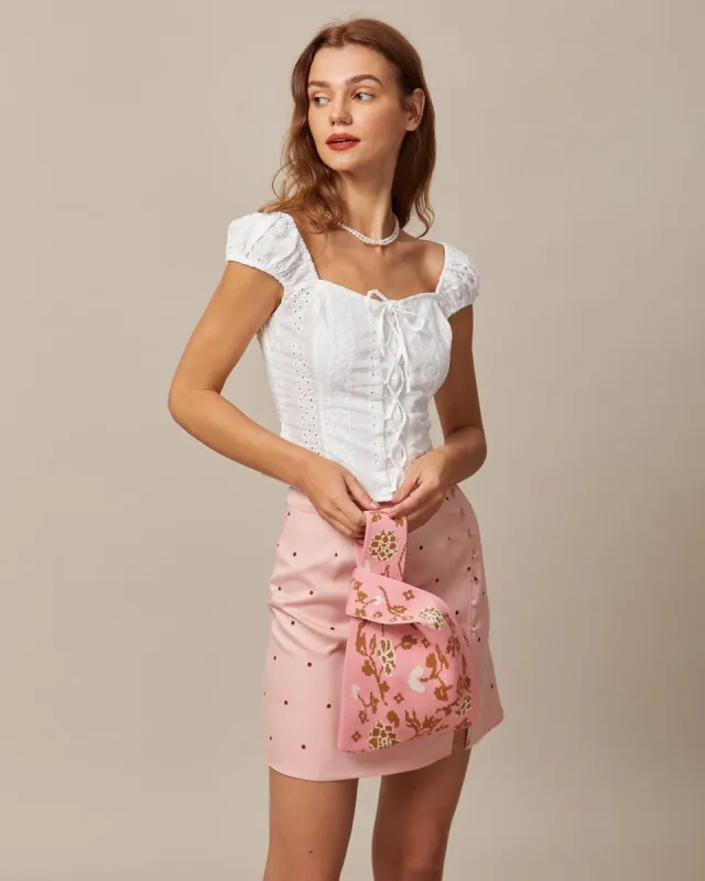 The White Lace Up Eyelet Embroidery Blouse sold by rihoas