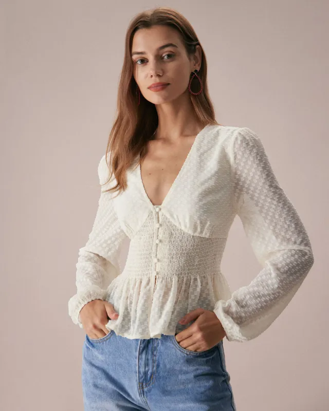 The Beige V Neck Ruffle Lantern Sleeve Blouse sold by rihoas