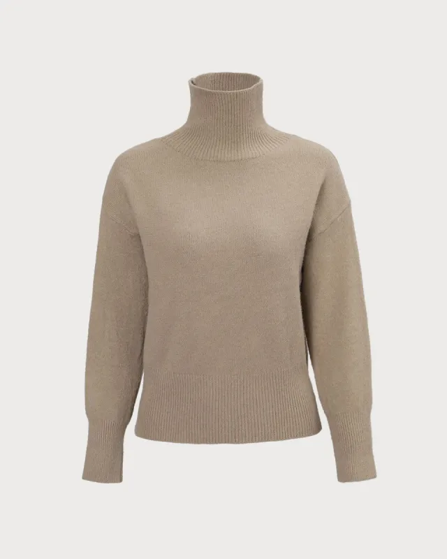 The Khaki Turtleneck Drop Shoulder Sweater sold by rihoas
