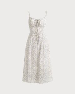 The Beige Floral Ruched Slip Midi Dress sold by rihoas