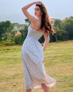 The Beige Floral Ruched Slip Midi Dress sold by rihoas