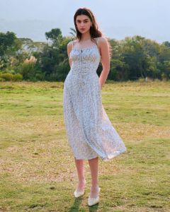 The Beige Floral Ruched Slip Midi Dress sold by rihoas