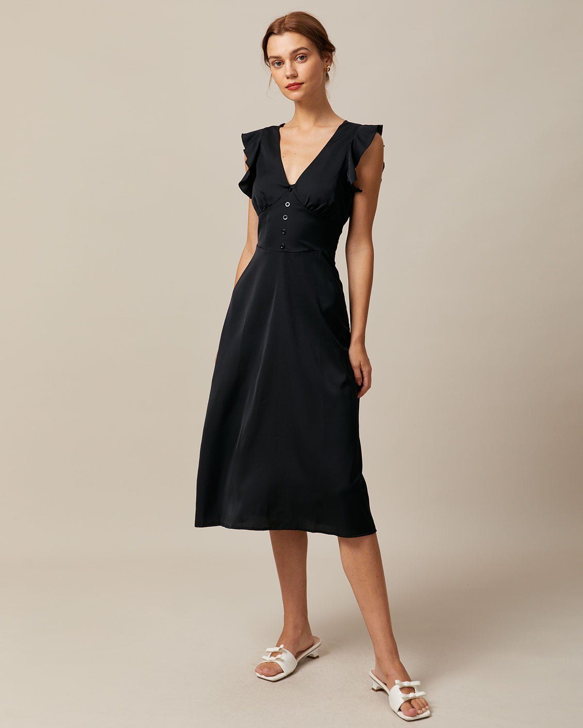 The Black V Neck Butterfly Sleeve Midi Dress sold by rihoas