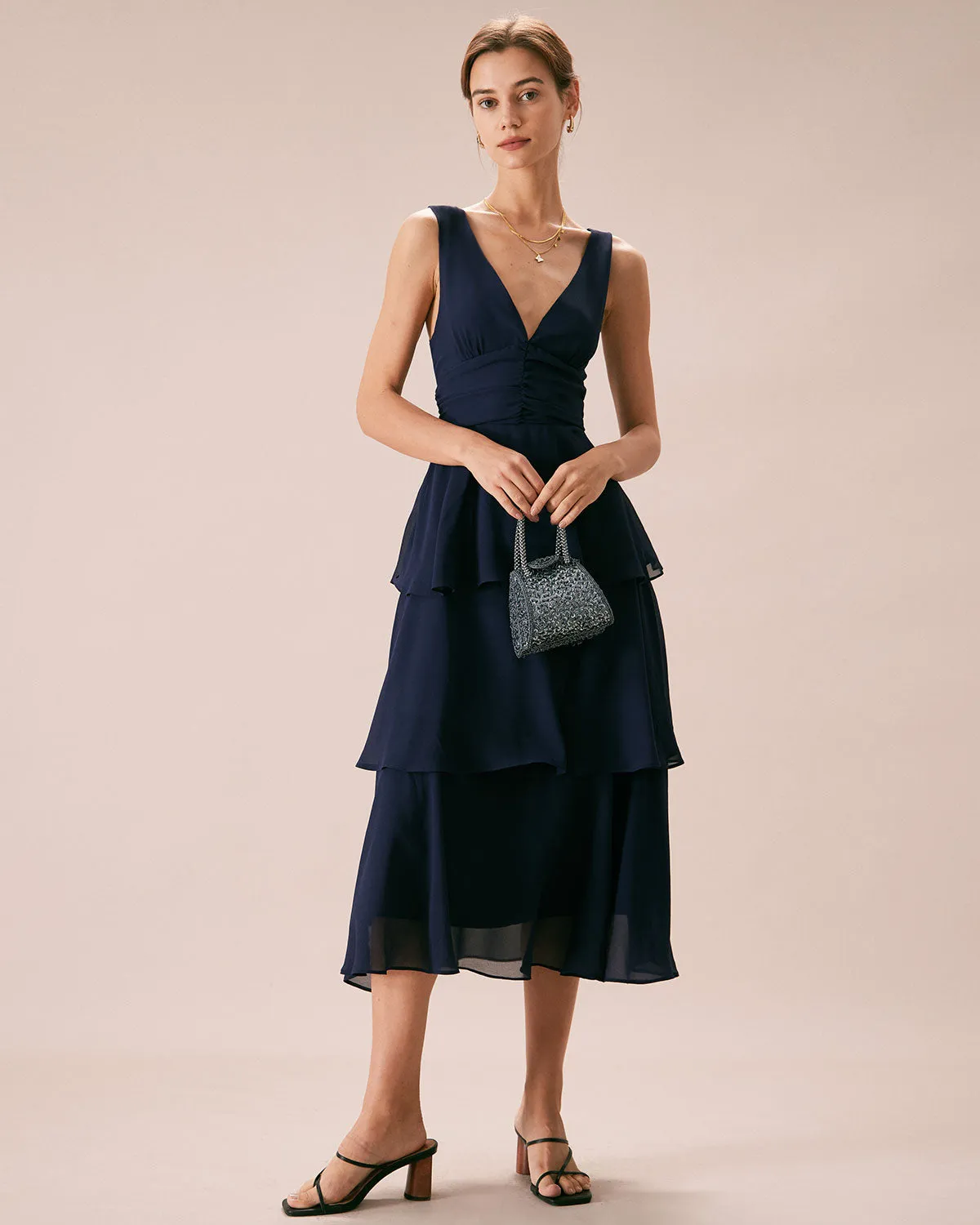 The Navy V Neck Ruffle Layered Midi Dress sold by rihoas product image thumbnail 2