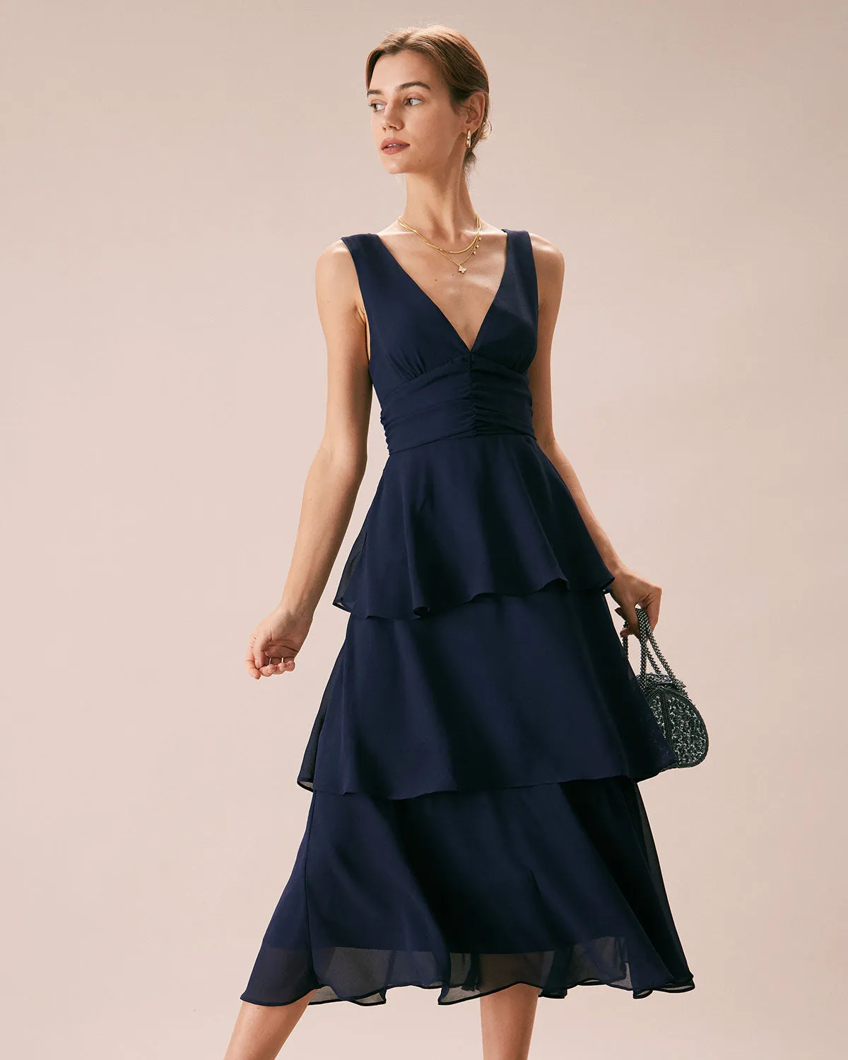 The Navy V Neck Ruffle Layered Midi Dress sold by rihoas product image thumbnail 3
