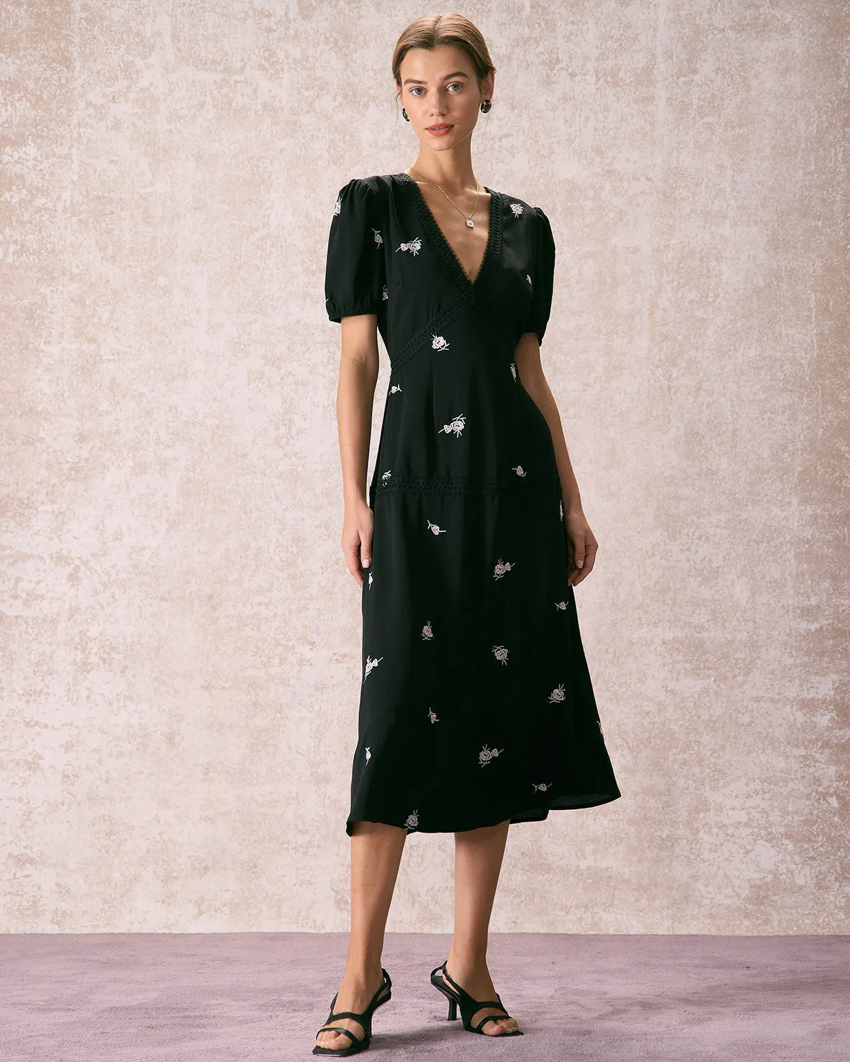 The Black V Neck Embroidery Floral Midi Dress sold by rihoas