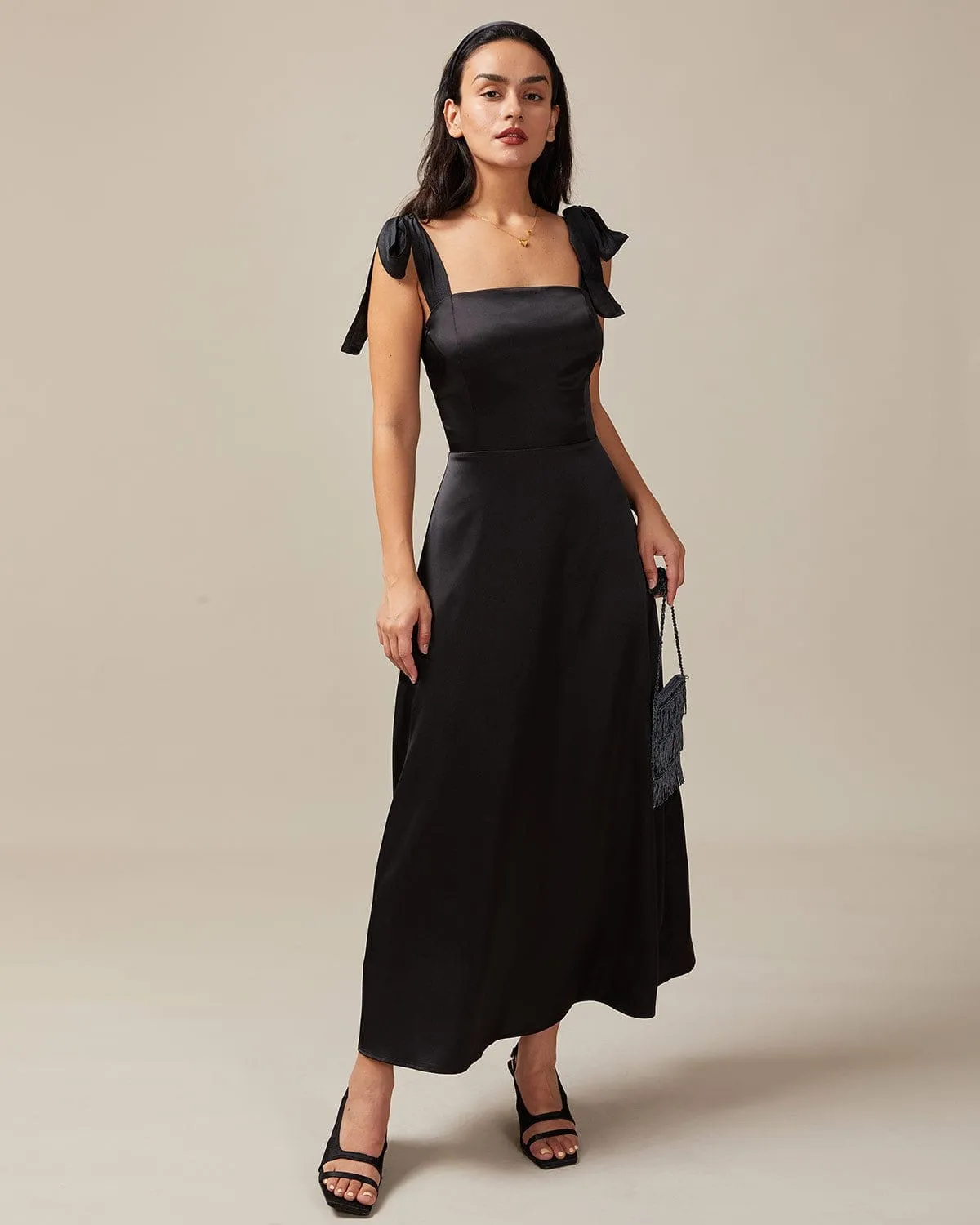 The Black Tie Strap Satin Maxi Dress sold by rihoas