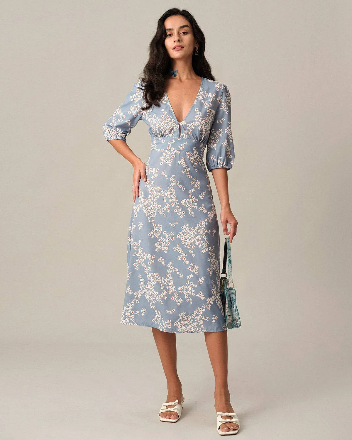 The V Neck Floral Midi Dress sold by rihoas