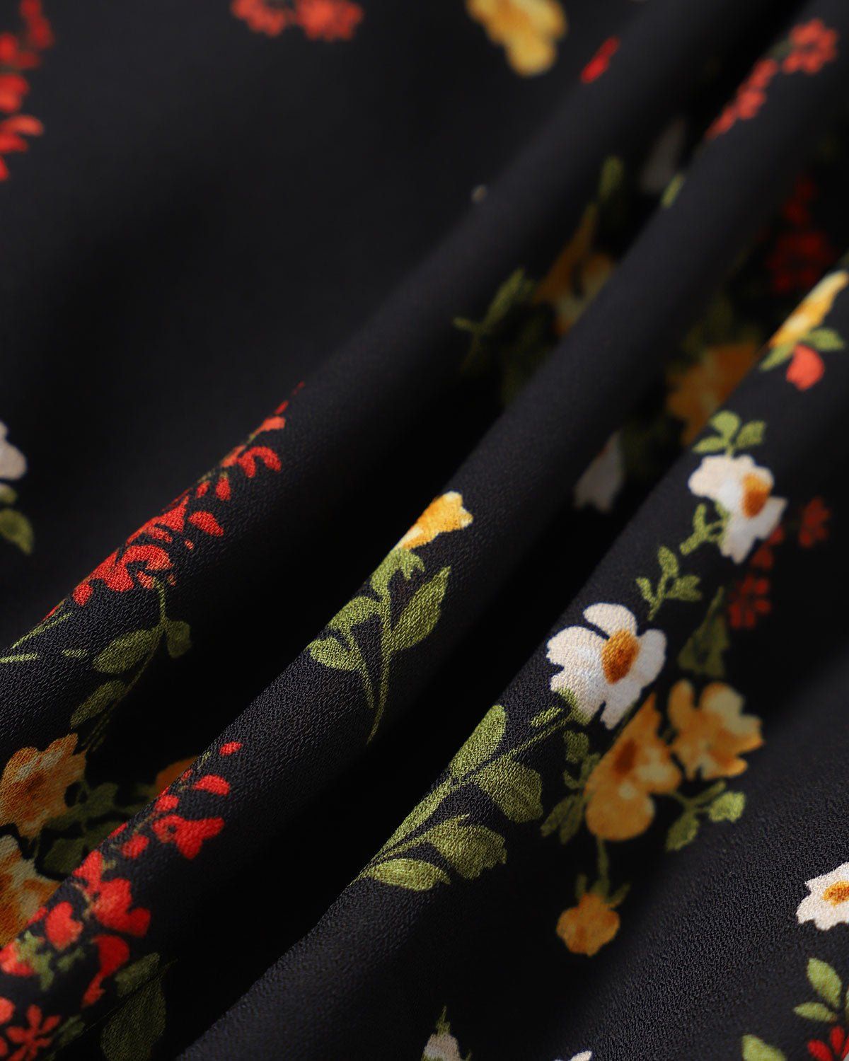The Black Floral Cutout Puff Sleeve Midi Dress sold by rihoas product image thumbnail 2