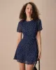 The Navy Crew Neck Polka Dot Cutout Mini Dress sold by rihoas