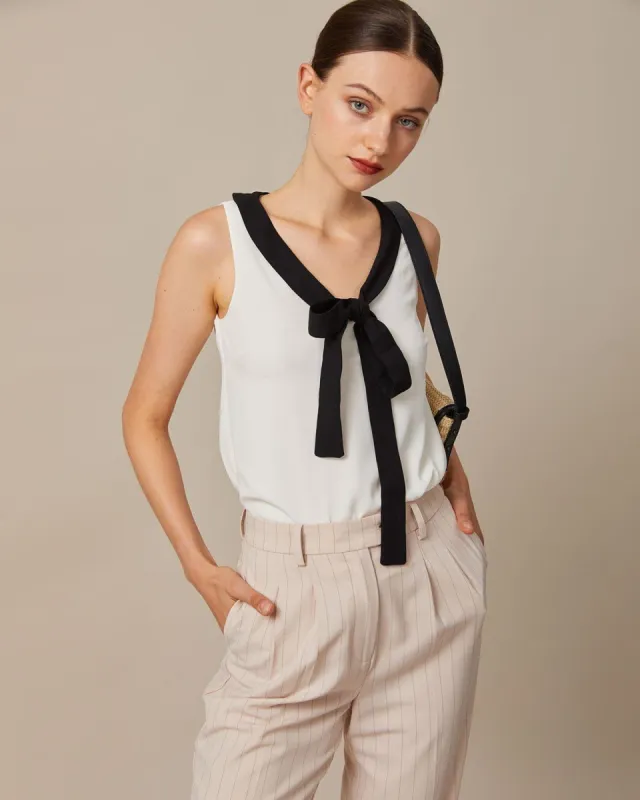 The White Contrast Bowknot Collar Blouse sold by rihoas
