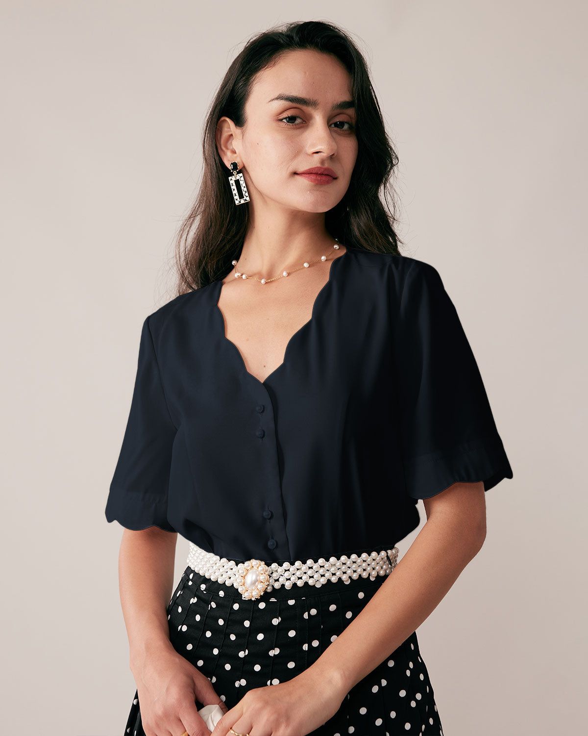 The Navy Ruffle Neckline Pearl Button Shirt sold by rihoas