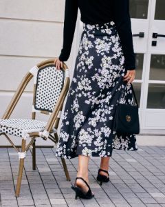 The Black High Waisted Floral Split Midi Skirt sold by rihoas
