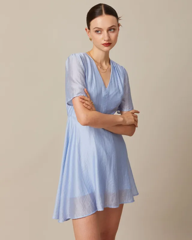 The Light Blue V Neck Pleated Mini Dress sold by rihoas