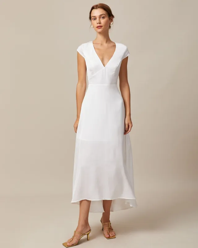 The White V Neck Cut Out Satin Maxi Dress sold by rihoas