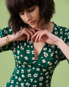 The Green V Neck Puff Sleeve Floral Mini Dress sold by rihoas